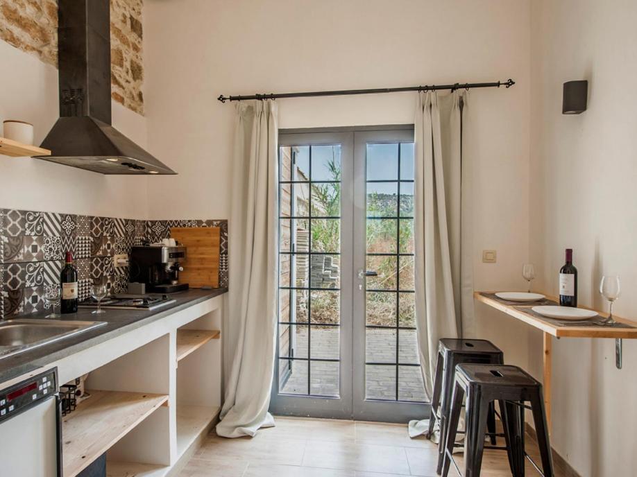 Отель Bramasole Charming House Комизо Экстерьер фото