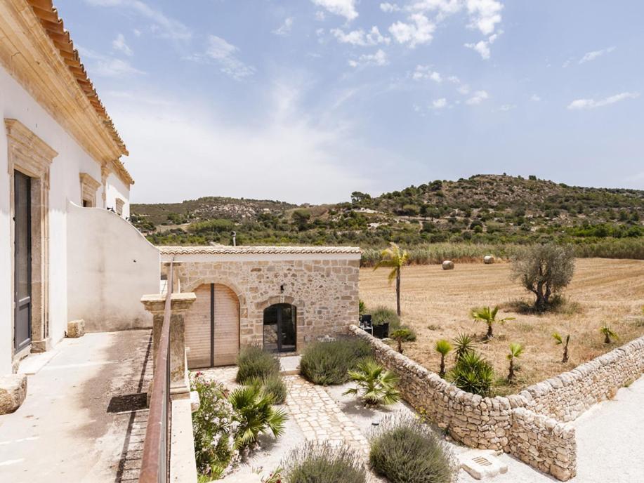 Отель Bramasole Charming House Комизо Экстерьер фото