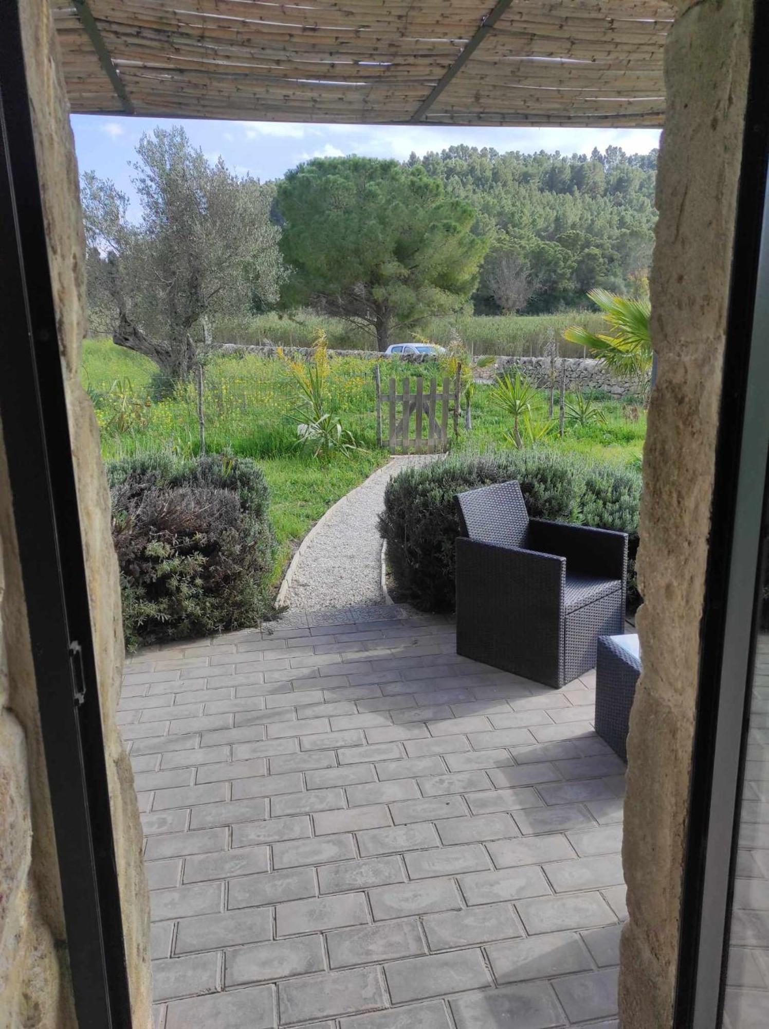 Отель Bramasole Charming House Комизо Экстерьер фото